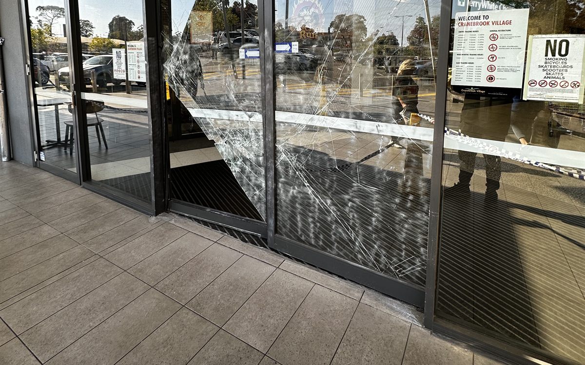 Police tape across a smashed shopfront door before 24/7 emergency glass repair in Northgate