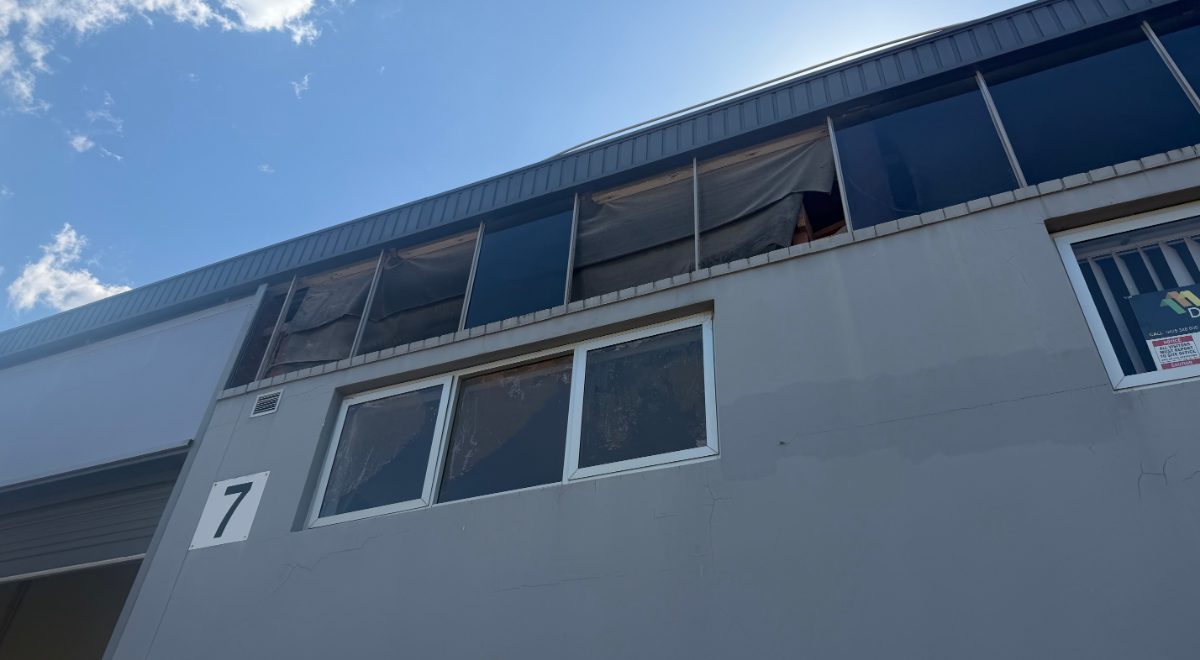 Commercial building glass replacement covered by insurance