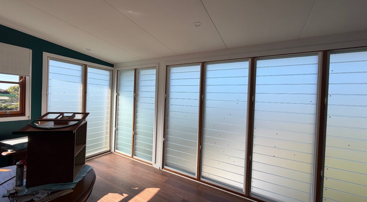 Frosted louvre window glass replaced on an insurance job