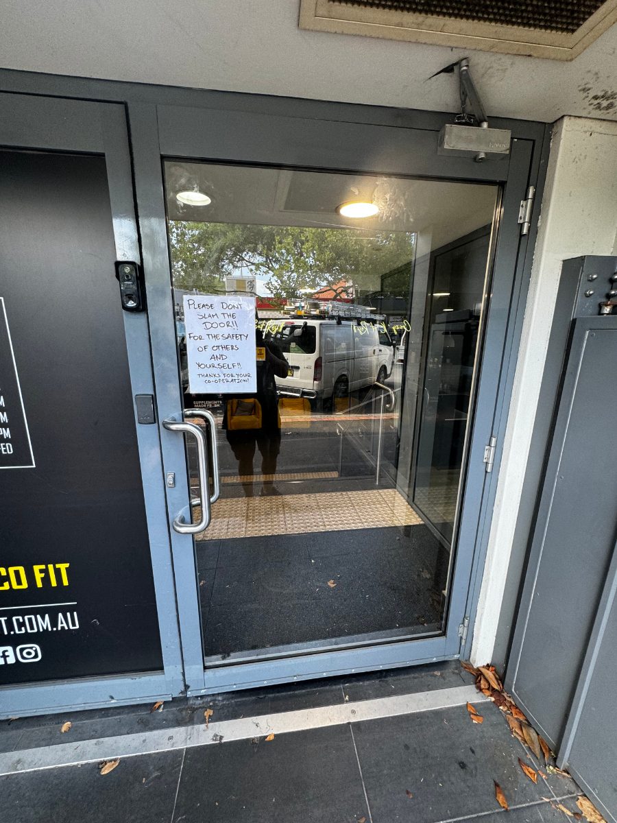 New glass fitted to a commercial entry door near Redcliffe