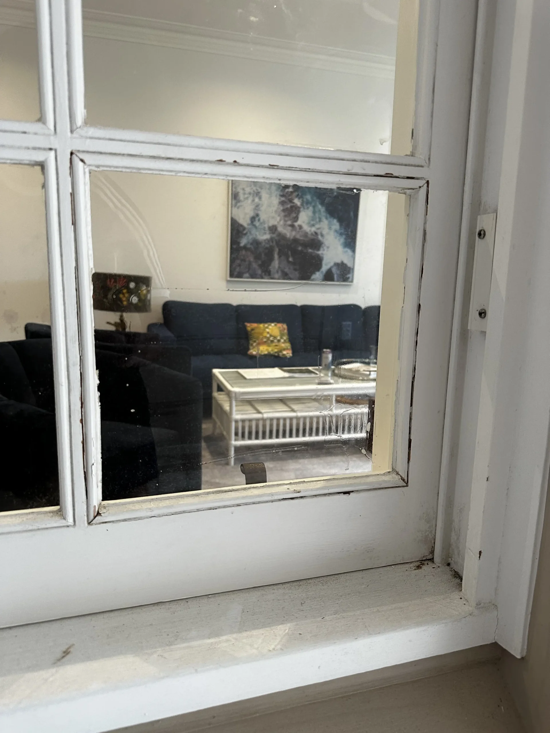 Brisbane City Glass glazier fitting new glass in Bilinga